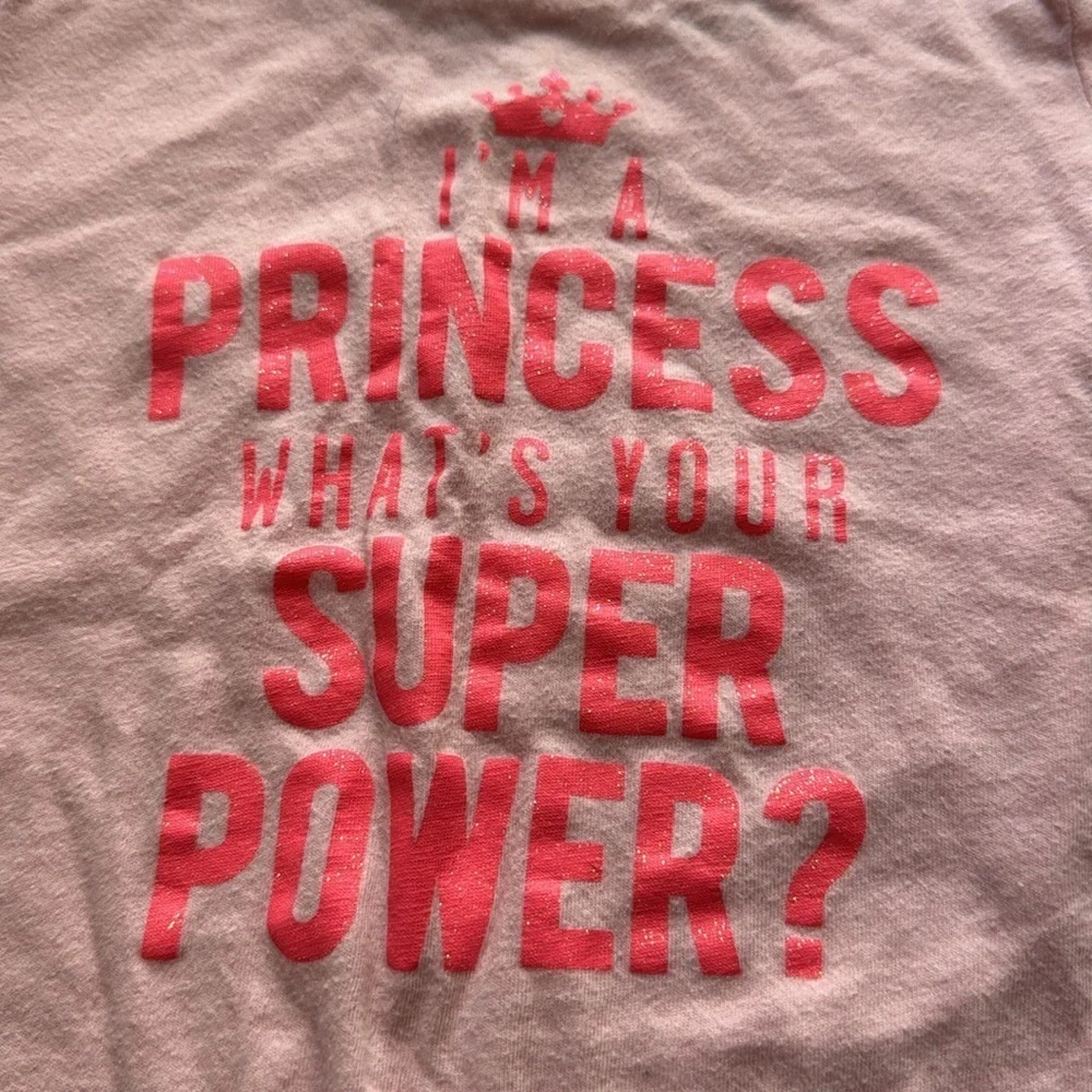 The Children’s Place Paloma Rodriguez pink sparkle graphic short sleeve tee.